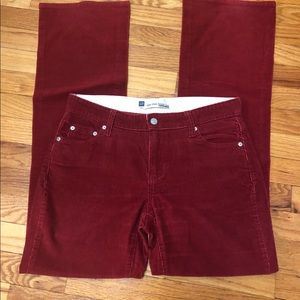 Red corduroy jeans .